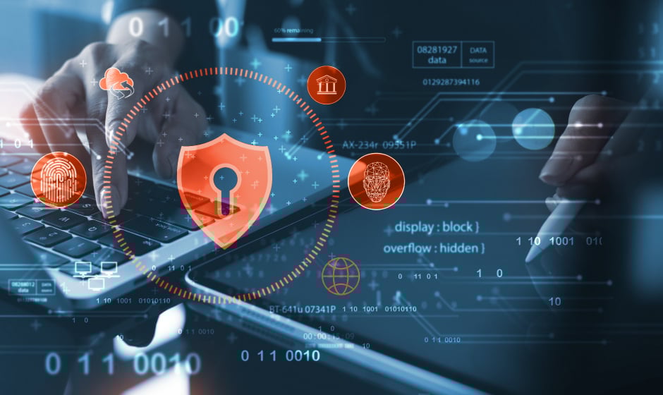 Hands typing on a laptop keyboard with a digital overlay showing a shield icon, data nodes, and security-related icons representing risk management and data protection in multifamily housing